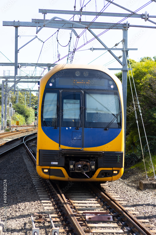 Naklejka premium Commuter train approaching a train station in Sydney NSW Australia