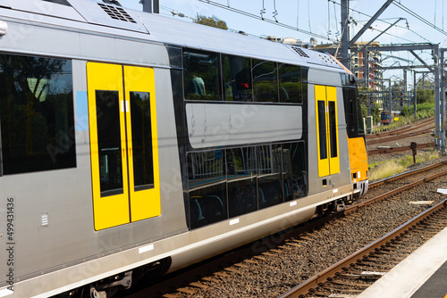 Commuter train approaching Homebush train station Sydney NSW Australia photo