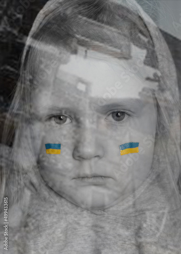 Ukrainian child girl in the background of the war with a painted flag on his cheeks. Multiexposure.