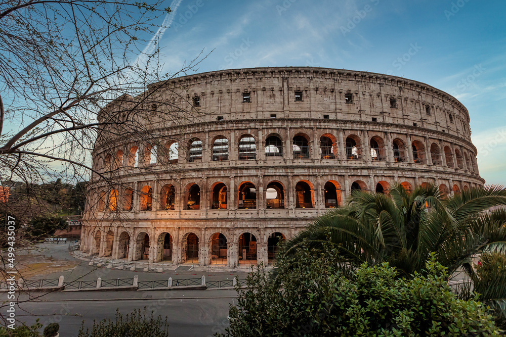 Rome Italy ; 03 28 2022 ; Photograph of the Colosseum in Rome with some very beautiful sunset skies