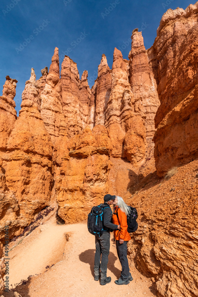 United States, Utah, Bryce Canyon National Park, Senior hiker couple kissing while exploring Bryce Canyon National Park United States, Utah, Bryce Canyon National Park, Senior hiker couple kissing while exploring Bryce Canyon National Park