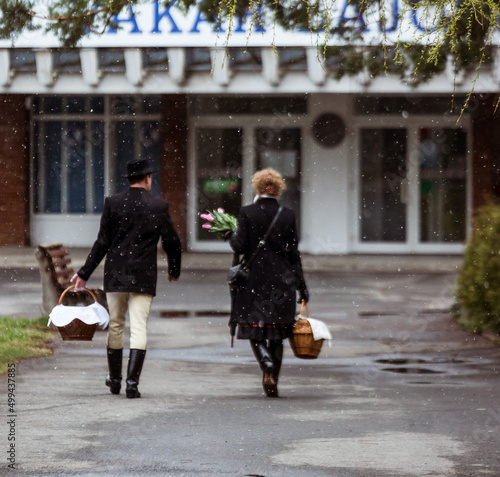 couple in traditional sekler clothes walking in the street