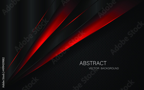 Abstract black and red polygons overlaid on dark steel mesh background with free space for design. modern technology innovation concept background
