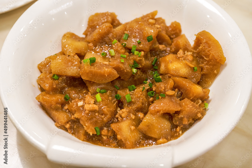 A traditional and delicious Guangxi dish, braised grapefruit peel in sauce A traditional and delicious Guangxi dish, braised grapefruit peel in sauce