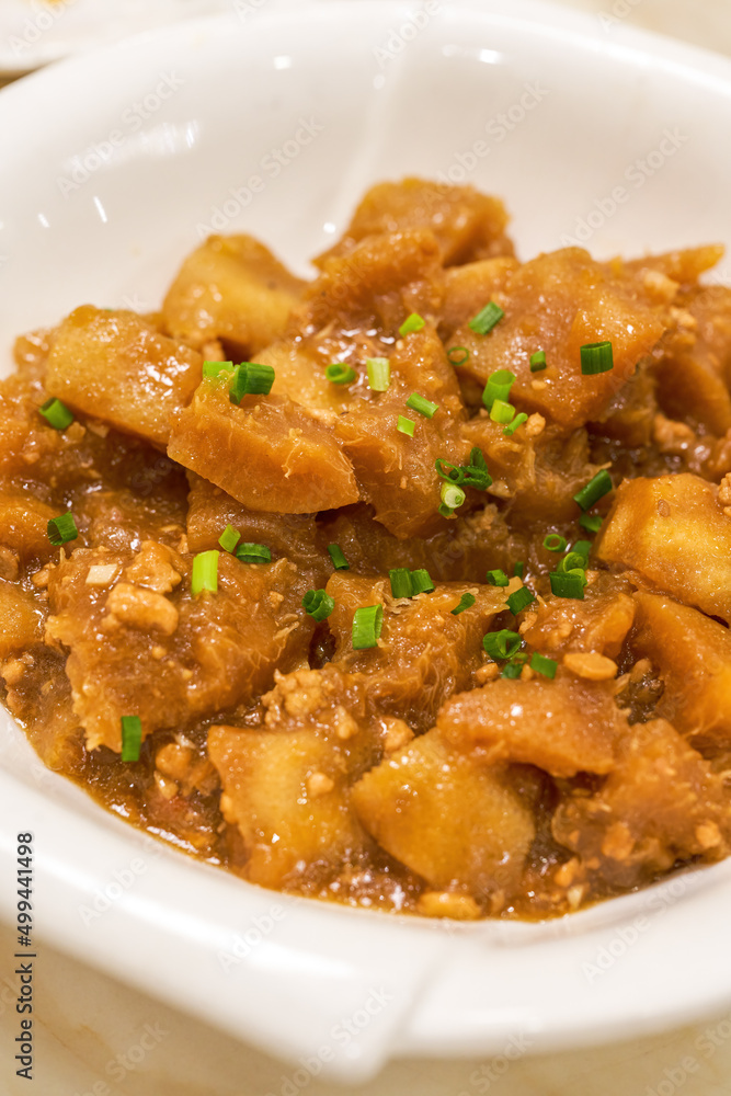A traditional and delicious Guangxi dish, braised grapefruit peel in sauce A traditional and delicious Guangxi dish, braised grapefruit peel in sauce