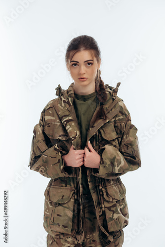 Girl in military uniform. Ukrainian. War in Ukraine. Bucha. on a white background