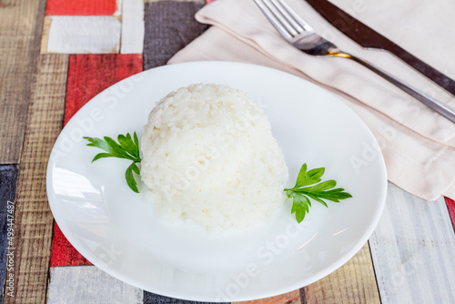 boiled rice in a white bowl side view