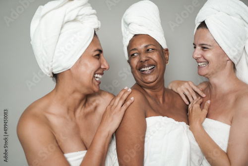Multiracial senior women having fun during beauty day