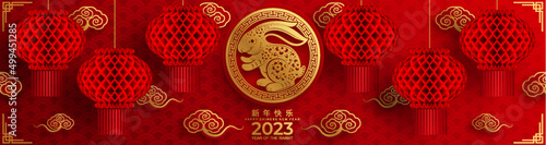 Fotografiet Happy chinese new year 2023 year of the rabbit zodiac sign with flower,lantern,asian elements gold paper cut style on color Background