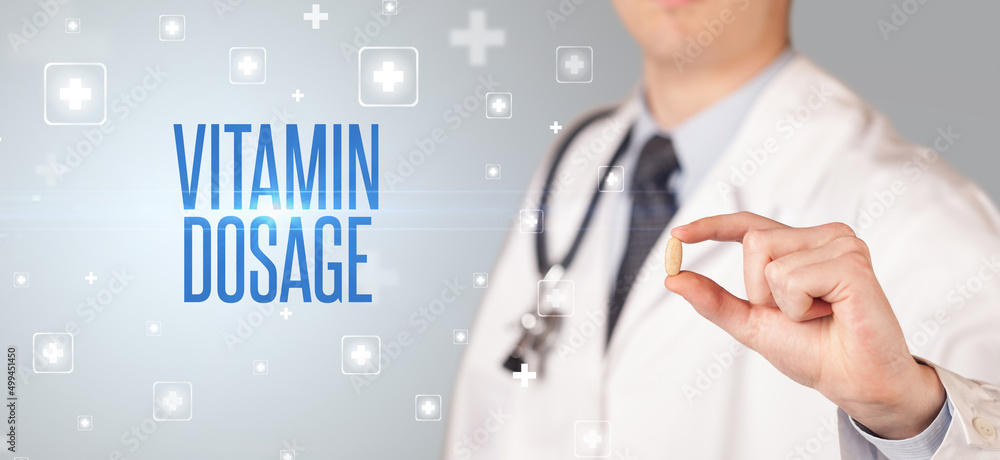 Close-up of a doctor giving a pill Close-up of a doctor giving a pill