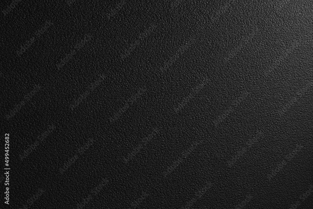Black leather in light for texture or background Black leather in light for texture or background