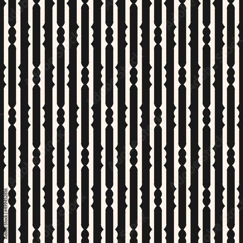 Elegant geometric seamless pattern with carved vertical stripes. Simple black and white abstract ornament. Monochrome graphic background texture. Repeat design for decor, furniture, wallpaper, print