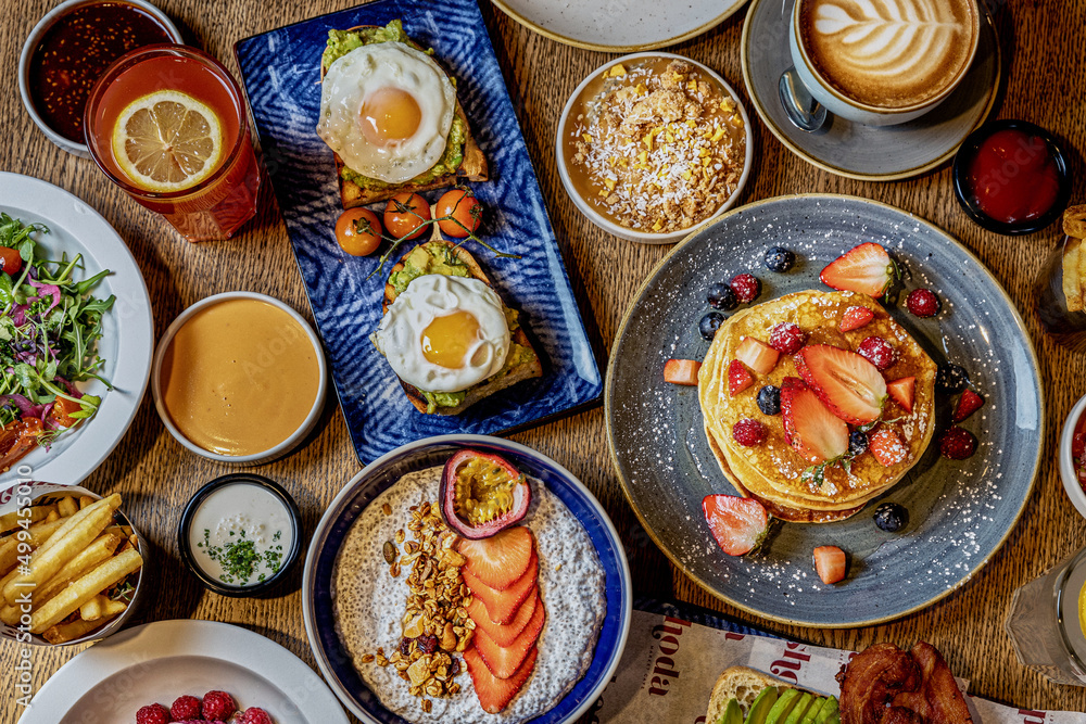 College of Breakfast Assortiment with pancakes, eggs, coffee College of Breakfast Assortiment with pancakes, eggs, coffee