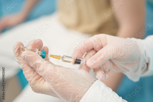Nurse with medicine for injection in hospital