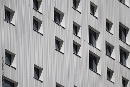 Windows on the facade of the building, in a modern minimalist architectural style