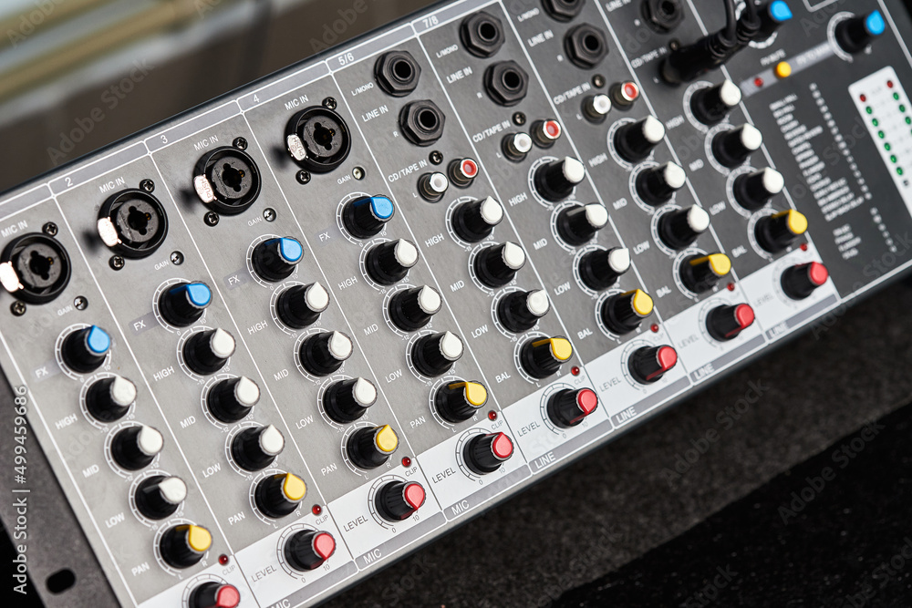 Audio sound mixer amplifier equipment, acoustic musical mixing engineering concept. Sound controller for mastering radio and television broadcasting. Multi-Channel Mix Processor. Close up.