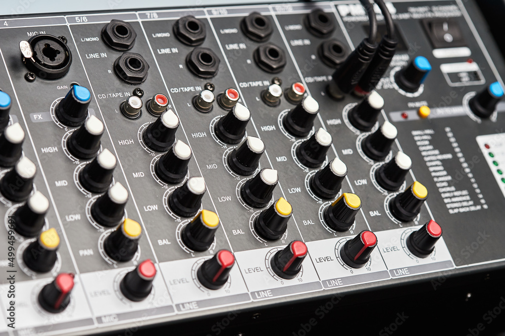 Audio sound mixer amplifier equipment, acoustic musical mixing engineering concept. Sound controller for mastering radio and television broadcasting. Multi-Channel Mix Processor. Close up. Audio sound mixer amplifier equipment, acoustic musical mixing engineering concept. Sound controller for mastering radio and television broadcasting. Multi-Channel Mix Processor. Close up.