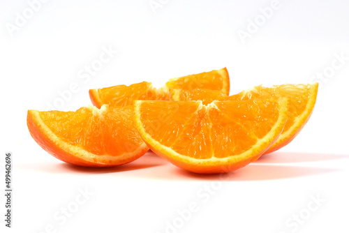 oranges, halved oranges, healthy fruit, mandarin oranges, vitamin C, against white background with refreshing water droplets