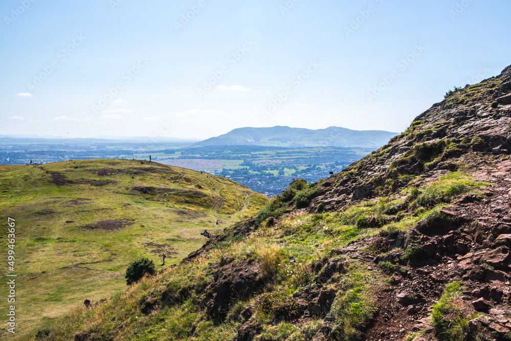 Scotland, Edinburgh. Holyrood park and ancient volcano. Beautiful panoramic view City of Edinburgh from the mountain Scotland, Edinburgh. Holyrood park and ancient volcano. Beautiful panoramic view City of Edinburgh from the mountain