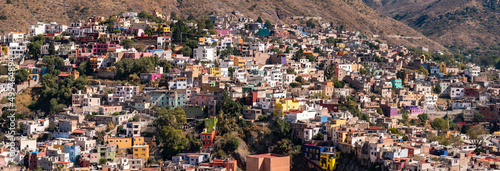 Valokuvatapetti Colorful neighborhood on the hillside in the historic city of Guanajuato, Mexico