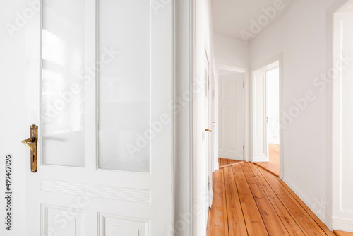 door and corridor in empty flat in renovated old building photo