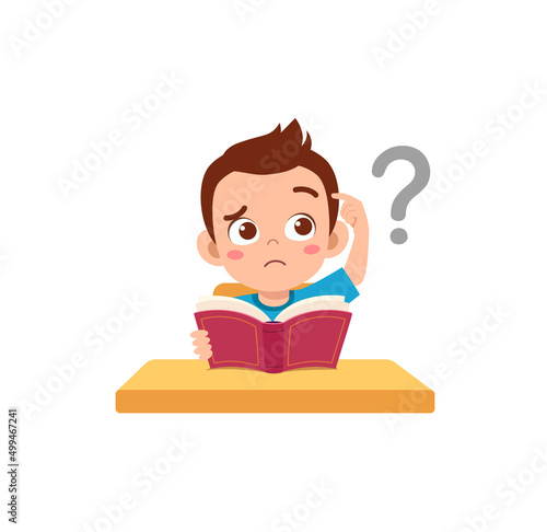 little kid reading book and feel confused