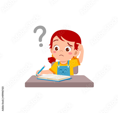 little kid reading book and feel confused