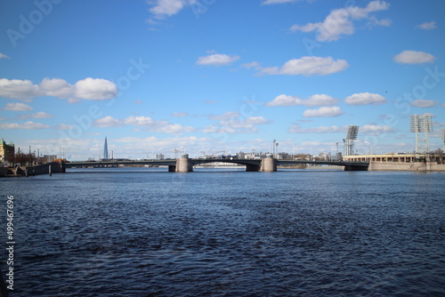 Drawbridge on a large river on a sunny day © Andrey