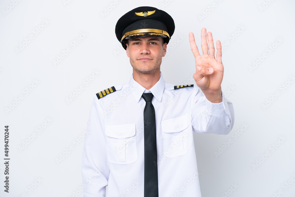 Airplane caucasian pilot isolated on white background happy and counting four with fingers Airplane caucasian pilot isolated on white background happy and counting four with fingers