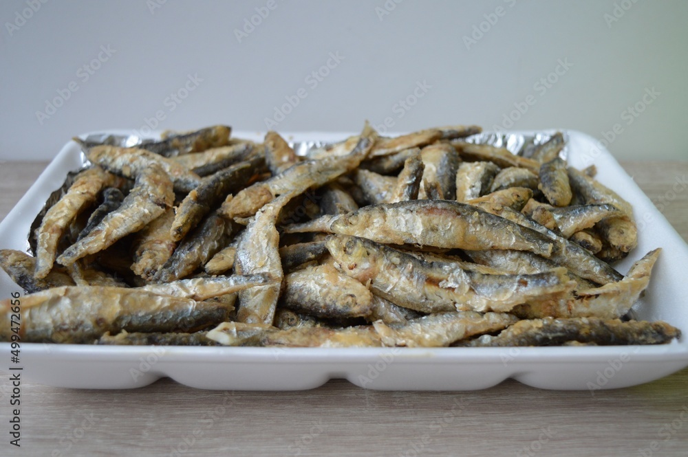 Fried fish Euroropean sprat or sardine, a small and tasty fish caught in the Irish Sea, the Black Sea, the Baltic Sea and the Sea of the Hebrides. Fried fish Euroropean sprat or sardine, a small and tasty fish caught in the Irish Sea, the Black Sea, the Baltic Sea and the Sea of the Hebrides.