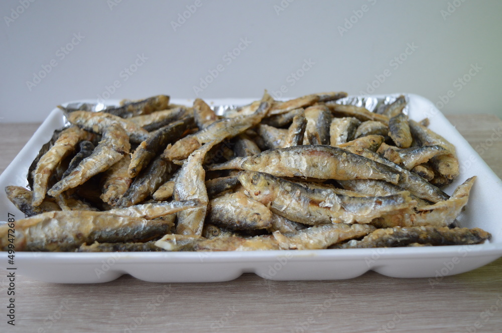 Fried fish Euroropean sprat or sardine, a small and tasty fish caught in the Irish Sea, the Black Sea, the Baltic Sea and the Sea of the Hebrides. Fried fish Euroropean sprat or sardine, a small and tasty fish caught in the Irish Sea, the Black Sea, the Baltic Sea and the Sea of the Hebrides.
