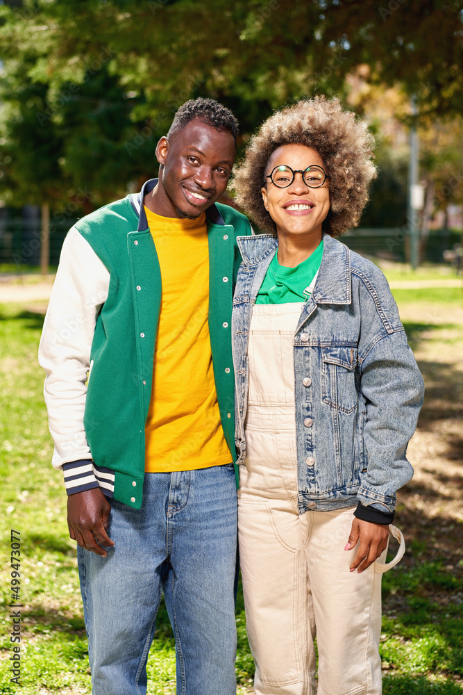 african american couple outdoors at the park african american couple outdoors at the park