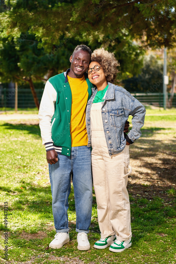 african american couple outdoors at the park african american couple outdoors at the park