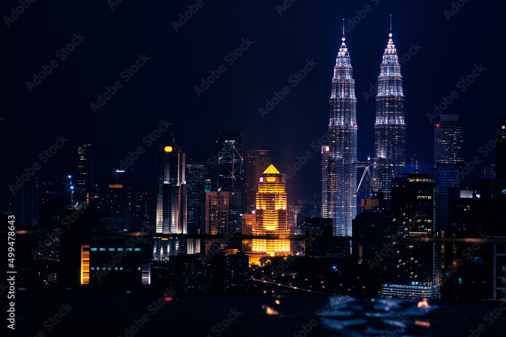 Lights of megapolis. Night cityscape. Kuala-Lumpur, Malaysia.