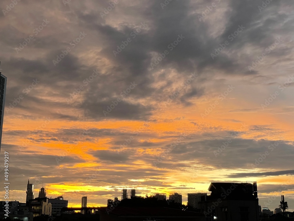 very beautiful twilight sky, a blend of orange and blue colors. beautiful view of the evening sky. clouds, sky and rainbow that adorn the atmosphere in the afternoon. Evening view in Jakarta. blur