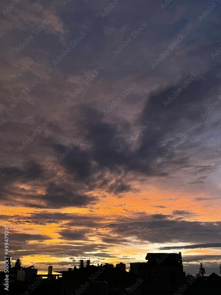 very beautiful twilight sky, a blend of orange and blue colors. beautiful view of the evening sky. clouds, sky and rainbow that adorn the atmosphere in the afternoon. Evening view in Jakarta. blur