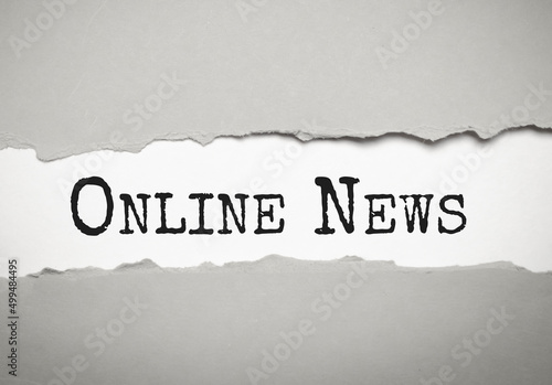 Torn paper with word Online News