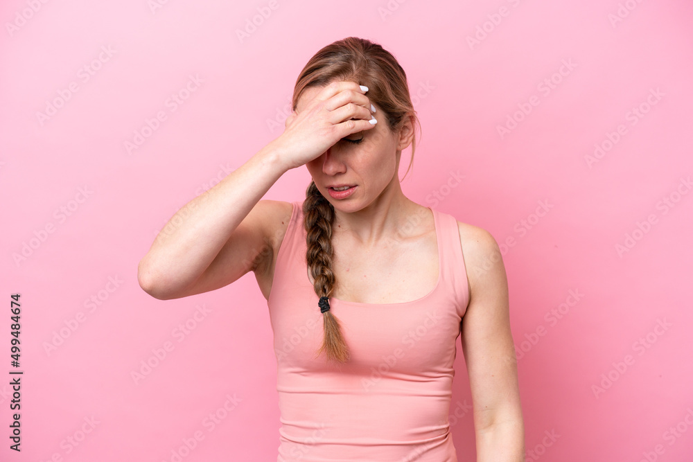 Young caucasian woman isolated on pink background with headache Young caucasian woman isolated on pink background with headache