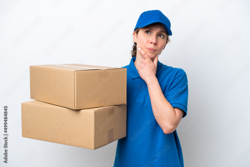 Delivery caucasian woman isolated on white background having doubts Delivery caucasian woman isolated on white background having doubts