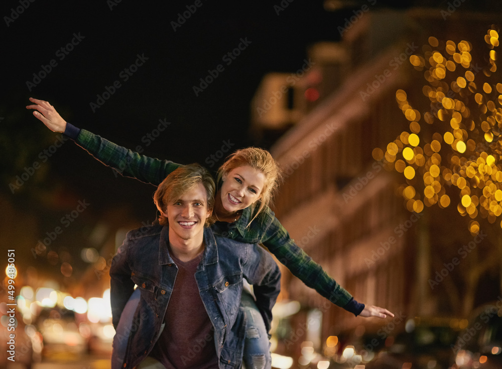Obraz premium Having a blast of a time. Shot of a young couple out on a date in the city.