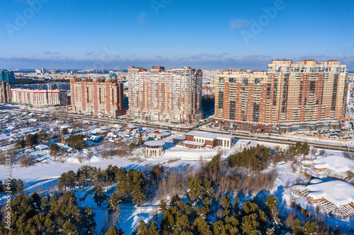 Surgut city in winter. Residential area, city development. Aerial view.