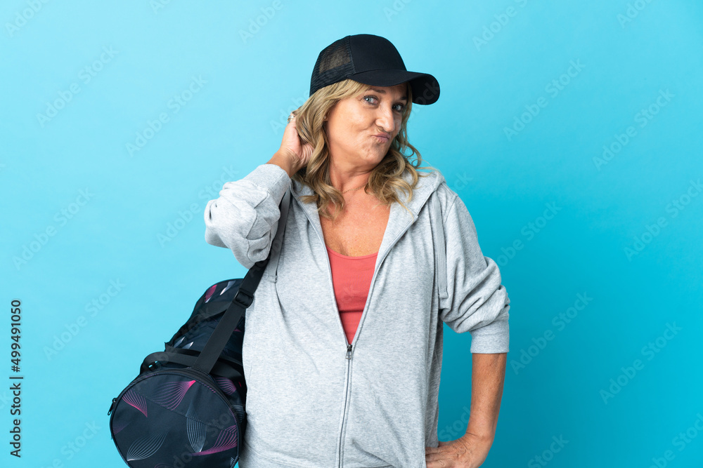 Middle aged sport woman over isolated background having doubts Middle aged sport woman over isolated background having doubts