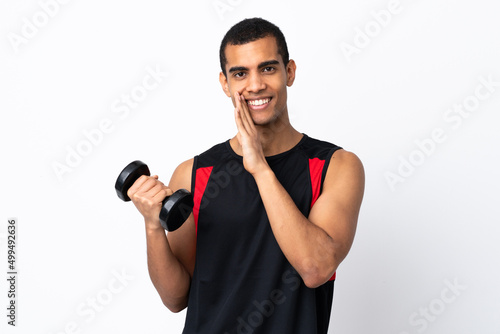 African American sport man over isolated white background whispering something © luismolinero