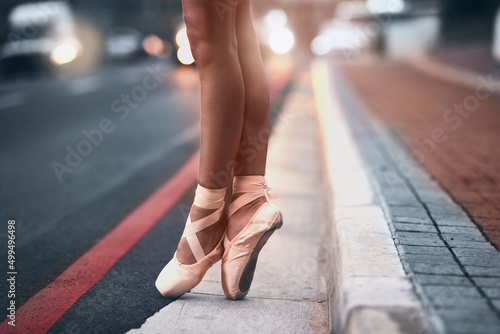 Take your passion with you wherever you go. Cropped shot of a ballet dancer standing on tiptoes against an urban background.