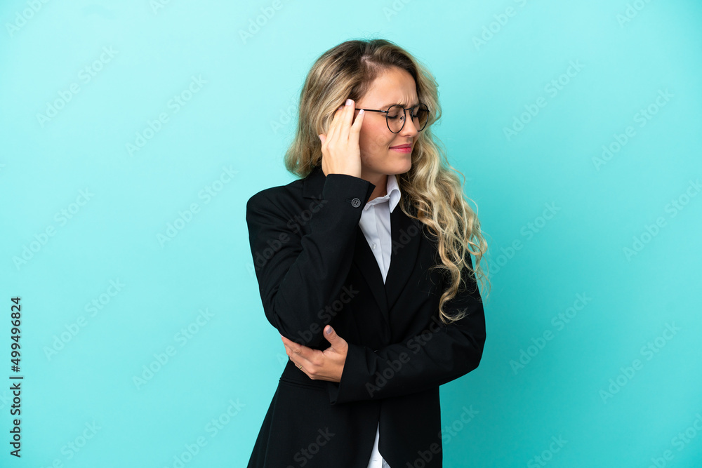 Brazilian business woman over isolated background with headache