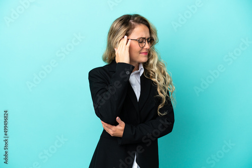 Brazilian business woman over isolated background with headache