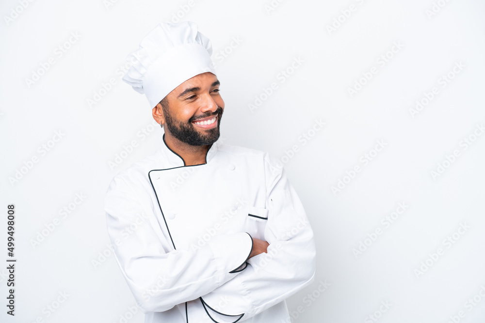 Young Brazilian chef man isolated on white background happy and smiling