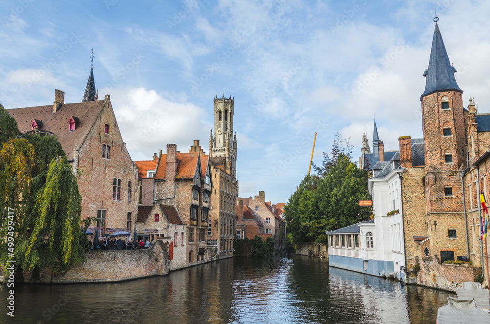 View from Rozenhoedkaai embankment of the historical town center with medieval architecture in Bruges, Belgium View from Rozenhoedkaai embankment of the historical town center with medieval architecture in Bruges, Belgium