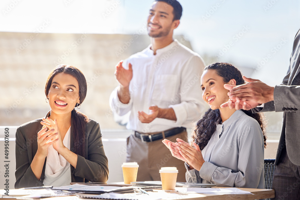 Inspired and excited to continue succeeding together. Shot of a group of businesspeople applauding during a meeting in an office. Inspired and excited to continue succeeding together. Shot of a group of businesspeople applauding during a meeting in an office.