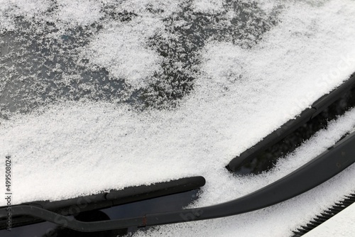 Close up of Graupel Snow pellets on a Windshield of a Vehicle